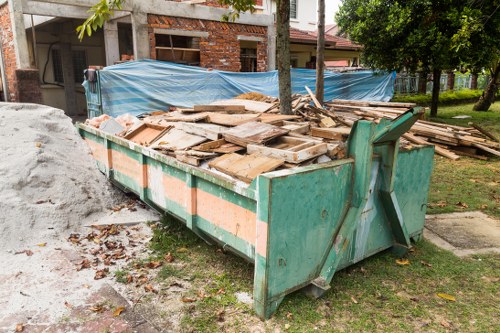 Construction site with waste management practices in Highbury