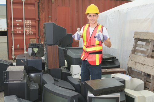 Customer service representative assisting with skip hire in Highbury