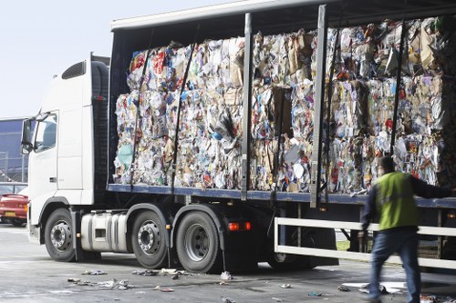 Professional builders waste removal team at work