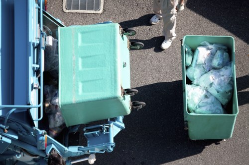 Workers sorting demolition waste materials
