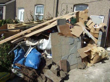 Construction waste disposal company in action in Highbury